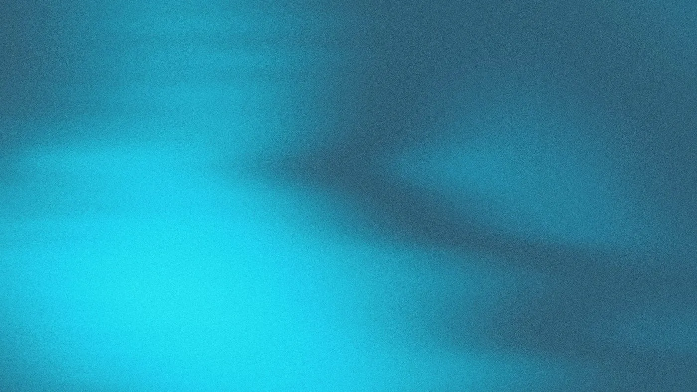 Soft, blurred cyan and teal gradient background